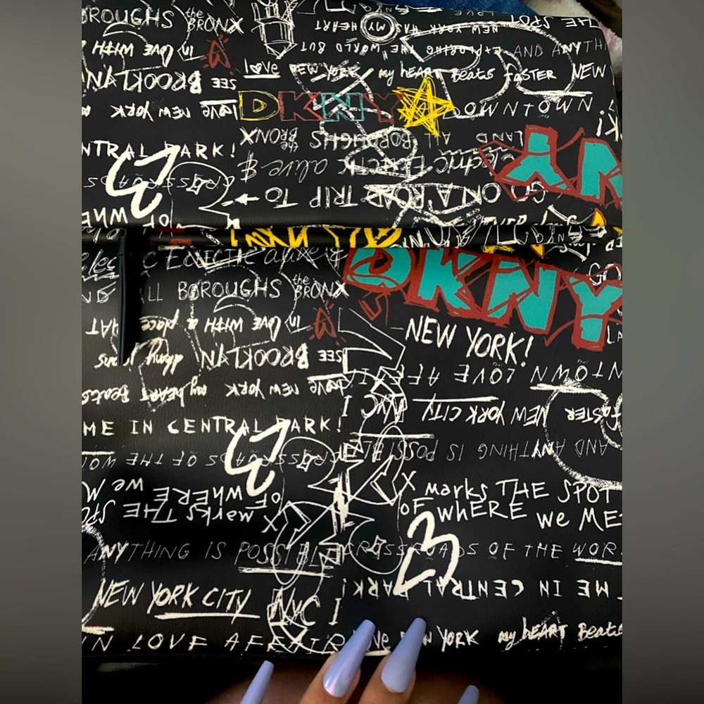 DKNY Tilly Graffiti fold over backpack tote purse